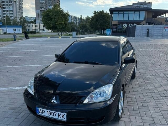 Чорний Міцубісі Lancer, об'ємом двигуна 1.6 л та пробігом 260 тис. км за 4999 $, фото 1 на Automoto.ua