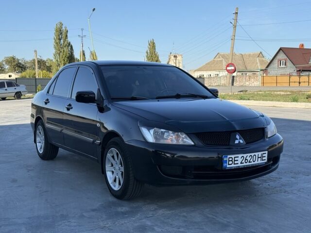 Чорний Міцубісі Lancer, об'ємом двигуна 1.6 л та пробігом 261 тис. км за 3665 $, фото 1 на Automoto.ua
