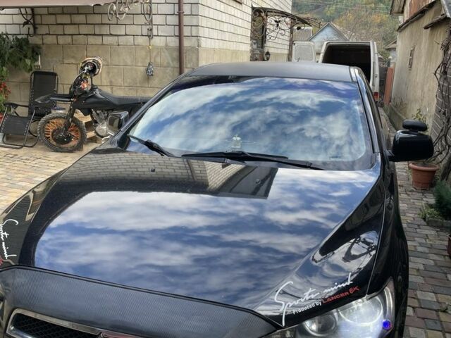 Чорний Міцубісі Lancer, об'ємом двигуна 2 л та пробігом 175 тис. км за 6500 $, фото 1 на Automoto.ua