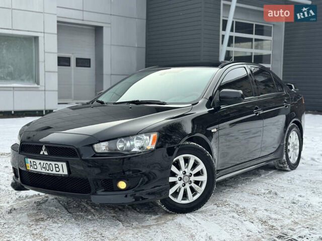 Черный Мицубиси Лансер, объемом двигателя 2 л и пробегом 180 тыс. км за 7000 $, фото 1 на Automoto.ua