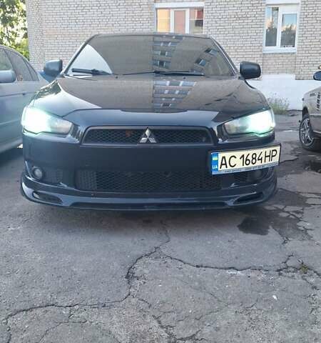 Чорний Міцубісі Lancer, об'ємом двигуна 2 л та пробігом 207 тис. км за 6500 $, фото 1 на Automoto.ua