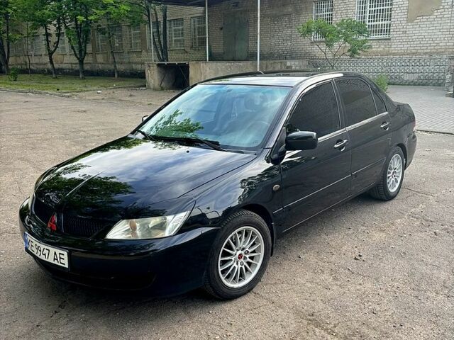 Чорний Міцубісі Lancer, об'ємом двигуна 1.6 л та пробігом 220 тис. км за 4200 $, фото 1 на Automoto.ua
