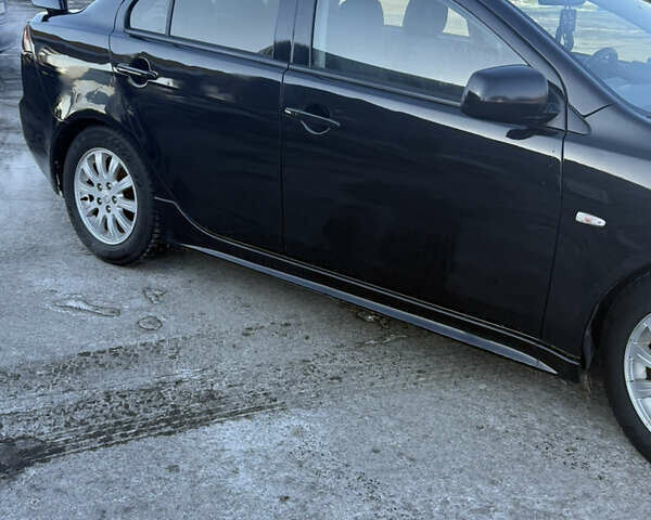 Чорний Міцубісі Lancer, об'ємом двигуна 2 л та пробігом 245 тис. км за 5000 $, фото 1 на Automoto.ua