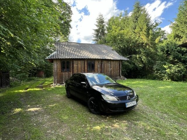 Чорний Міцубісі Lancer, об'ємом двигуна 1.6 л та пробігом 263 тис. км за 2850 $, фото 1 на Automoto.ua