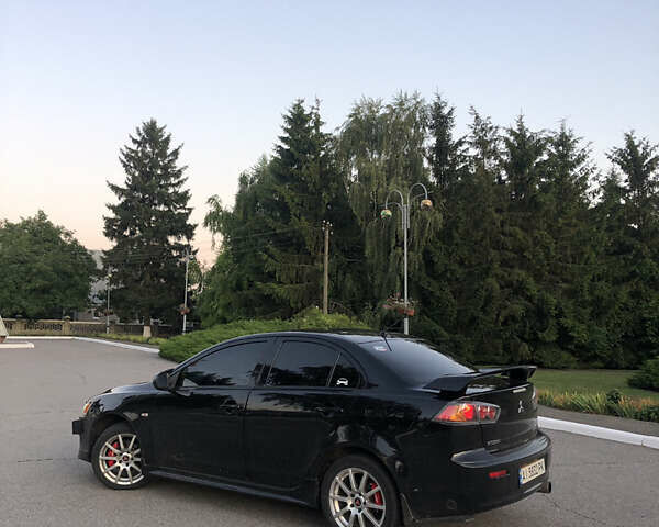 Черный Мицубиси Лансер, объемом двигателя 1.5 л и пробегом 260 тыс. км за 6000 $, фото 1 на Automoto.ua