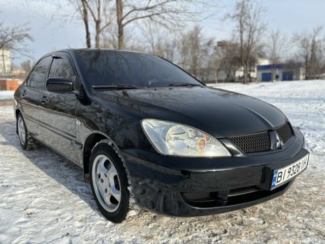 Чорний Міцубісі Lancer, об'ємом двигуна 1.6 л та пробігом 181 тис. км за 4350 $, фото 1 на Automoto.ua