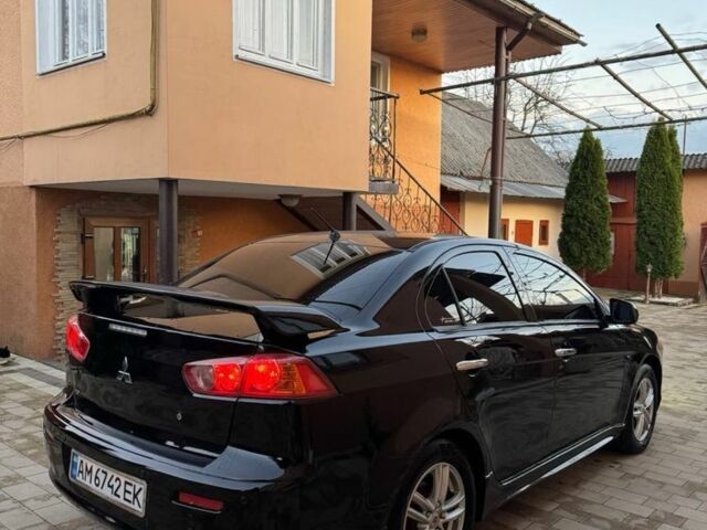Черный Мицубиси Лансер, объемом двигателя 2 л и пробегом 247 тыс. км за 4700 $, фото 1 на Automoto.ua