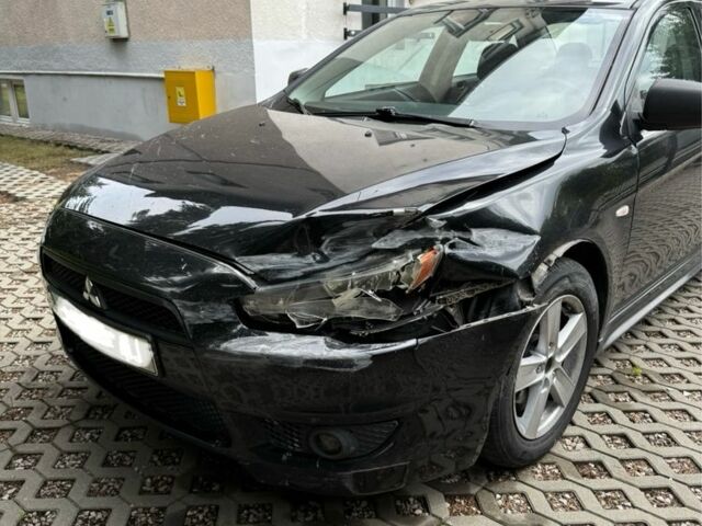 Чорний Міцубісі Lancer, об'ємом двигуна 2 л та пробігом 245 тис. км за 3500 $, фото 1 на Automoto.ua