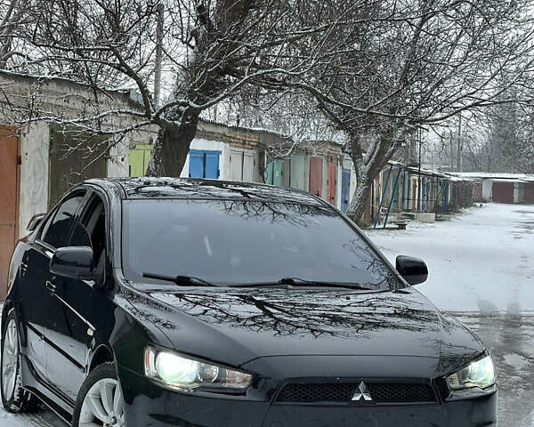 Чорний Міцубісі Lancer, об'ємом двигуна 2 л та пробігом 182 тис. км за 6999 $, фото 1 на Automoto.ua