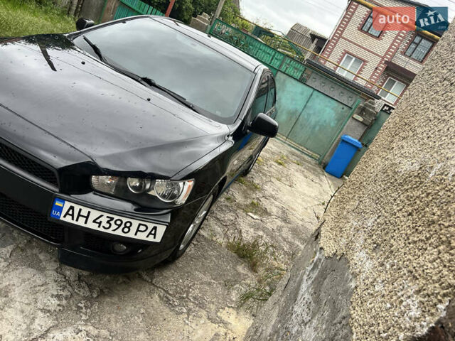 Чорний Міцубісі Lancer, об'ємом двигуна 2 л та пробігом 200 тис. км за 6900 $, фото 1 на Automoto.ua