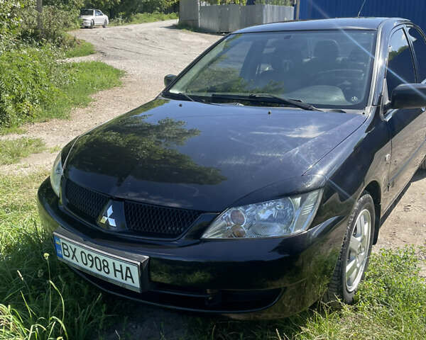 Чорний Міцубісі Lancer, об'ємом двигуна 1.6 л та пробігом 171 тис. км за 4700 $, фото 1 на Automoto.ua