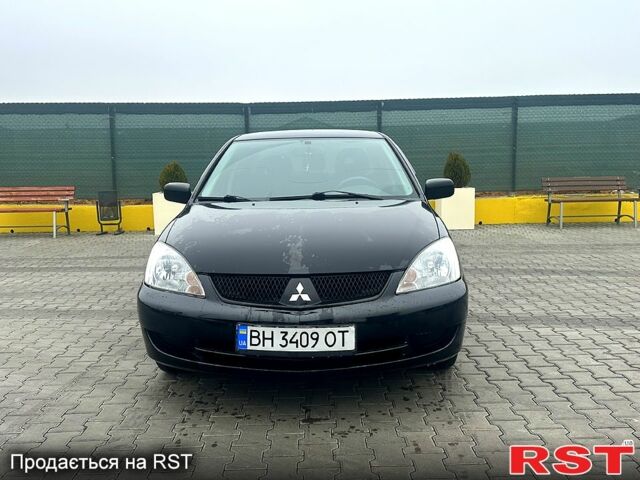 Чорний Міцубісі Lancer, об'ємом двигуна 1.6 л та пробігом 248 тис. км за 3950 $, фото 1 на Automoto.ua
