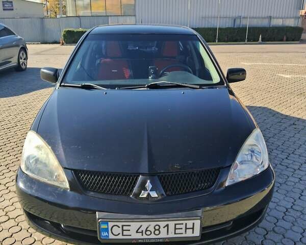Міцубісі Lancer 2007 у Чернівцях на Automoto.ua Чорний Міцубісі Lancer, об'ємом двигуна 1.58 л та пробігом 247 тис. км за 4300 $, фото 1 на Automoto.ua