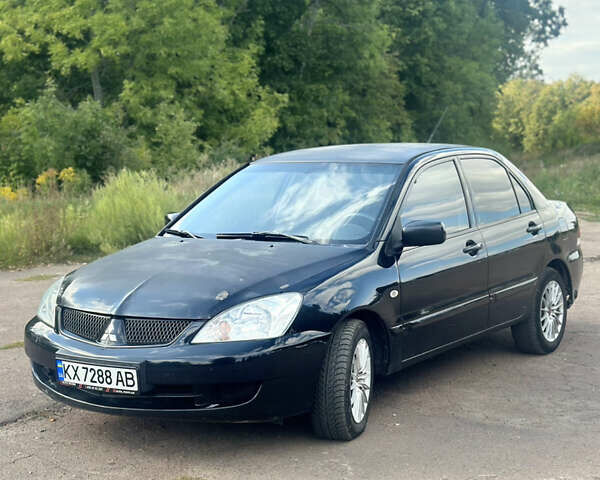 Мицубиси Лансер 2007 в Харькове на Automoto.ua Черный Мицубиси Лансер, объемом двигателя 1.58 л и пробегом 278 тыс. км за 3500 $, фото 1 на Automoto.ua