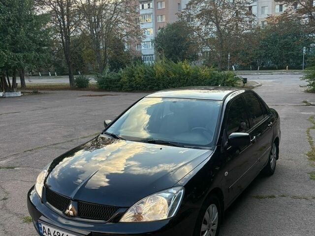 Чорний Міцубісі Lancer, об'ємом двигуна 1.6 л та пробігом 240 тис. км за 3650 $, фото 1 на Automoto.ua