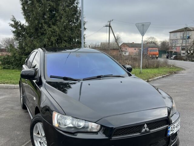 Черный Мицубиси Лансер, объемом двигателя 2 л и пробегом 350 тыс. км за 6700 $, фото 1 на Automoto.ua