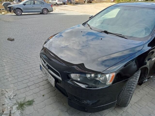 Чорний Міцубісі Lancer, об'ємом двигуна 2 л та пробігом 230 тис. км за 7000 $, фото 1 на Automoto.ua