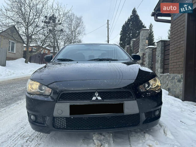 Чорний Міцубісі Lancer, об'ємом двигуна 2 л та пробігом 200 тис. км за 6800 $, фото 1 на Automoto.ua