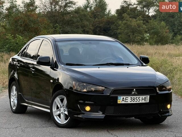 Чорний Міцубісі Lancer, об'ємом двигуна 2 л та пробігом 321 тис. км за 5799 $, фото 1 на Automoto.ua