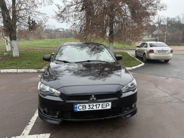 Черный Мицубиси Лансер, объемом двигателя 2 л и пробегом 281 тыс. км за 6000 $, фото 1 на Automoto.ua