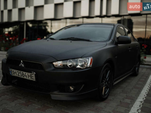 Чорний Міцубісі Lancer, об'ємом двигуна 2 л та пробігом 203 тис. км за 7000 $, фото 1 на Automoto.ua