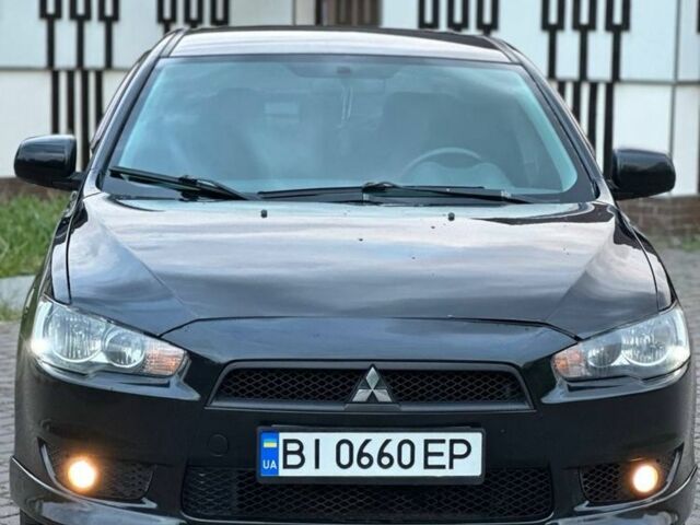 Чорний Міцубісі Lancer, об'ємом двигуна 2 л та пробігом 184 тис. км за 6900 $, фото 1 на Automoto.ua
