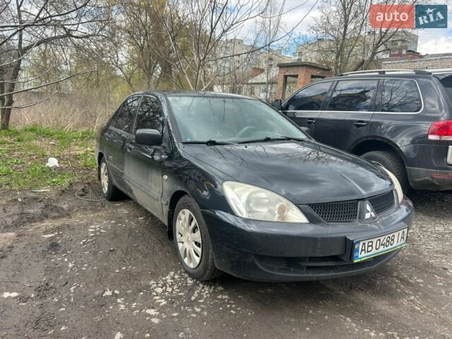 Чорний Міцубісі Lancer, об'ємом двигуна 1.6 л та пробігом 260 тис. км за 3050 $, фото 1 на Automoto.ua
