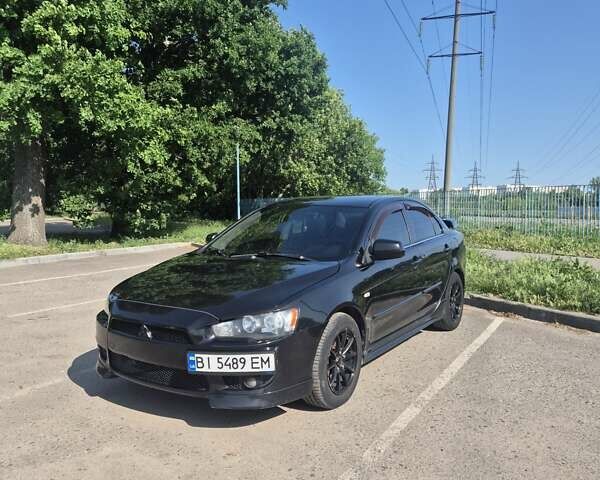 Чорний Міцубісі Lancer, об'ємом двигуна 2 л та пробігом 243 тис. км за 6600 $, фото 1 на Automoto.ua