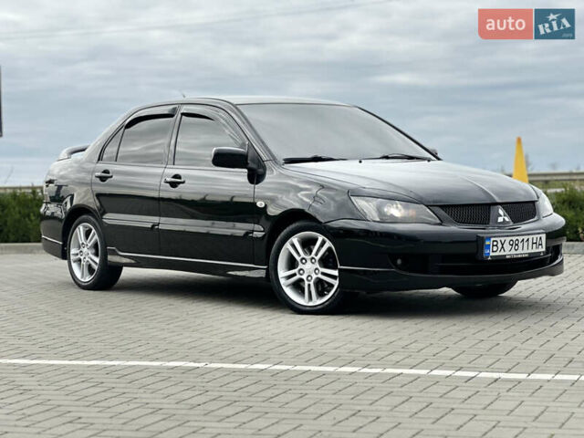 Чорний Міцубісі Lancer, об'ємом двигуна 2 л та пробігом 275 тис. км за 5300 $, фото 1 на Automoto.ua