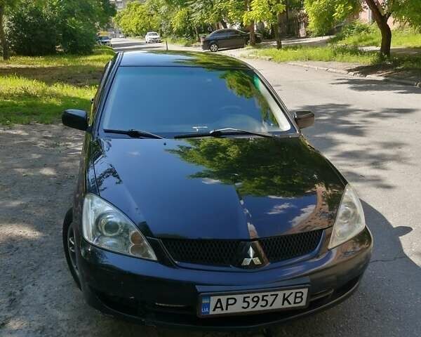 Чорний Міцубісі Lancer, об'ємом двигуна 1.6 л та пробігом 277 тис. км за 5300 $, фото 1 на Automoto.ua