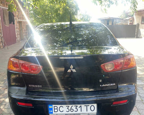 Чорний Міцубісі Lancer, об'ємом двигуна 1.5 л та пробігом 241 тис. км за 5400 $, фото 1 на Automoto.ua