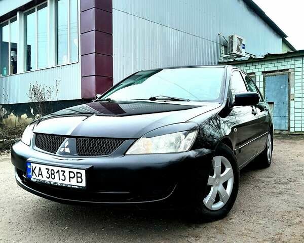 Чорний Міцубісі Lancer, об'ємом двигуна 1.6 л та пробігом 280 тис. км за 4750 $, фото 1 на Automoto.ua