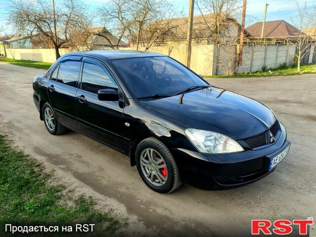Чорний Міцубісі Lancer, об'ємом двигуна 1.6 л та пробігом 250 тис. км за 3650 $, фото 1 на Automoto.ua