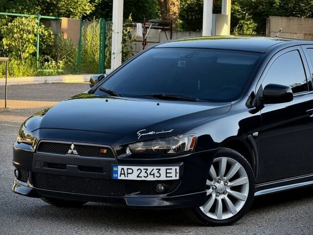 Чорний Міцубісі Lancer, об'ємом двигуна 2 л та пробігом 203 тис. км за 6900 $, фото 1 на Automoto.ua
