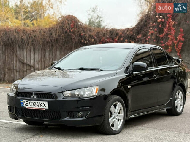 Чорний Міцубісі Lancer, об'ємом двигуна 2 л та пробігом 224 тис. км за 6500 $, фото 1 на Automoto.ua