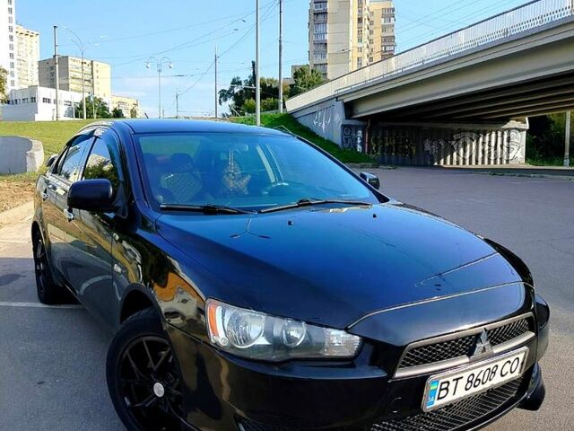 Черный Мицубиси Лансер, объемом двигателя 1.5 л и пробегом 215 тыс. км за 5600 $, фото 1 на Automoto.ua
