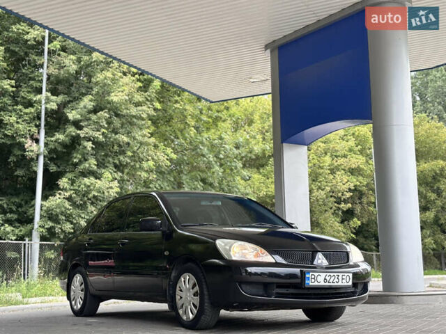 Чорний Міцубісі Lancer, об'ємом двигуна 1.6 л та пробігом 173 тис. км за 3700 $, фото 1 на Automoto.ua