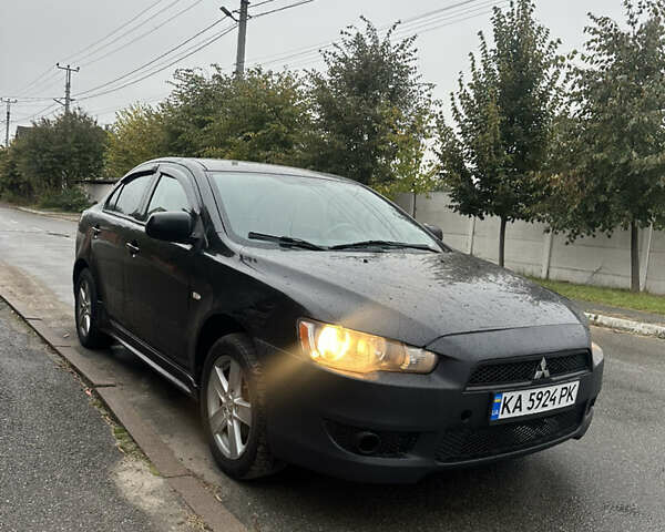 Чорний Міцубісі Lancer, об'ємом двигуна 2 л та пробігом 292 тис. км за 4400 $, фото 1 на Automoto.ua