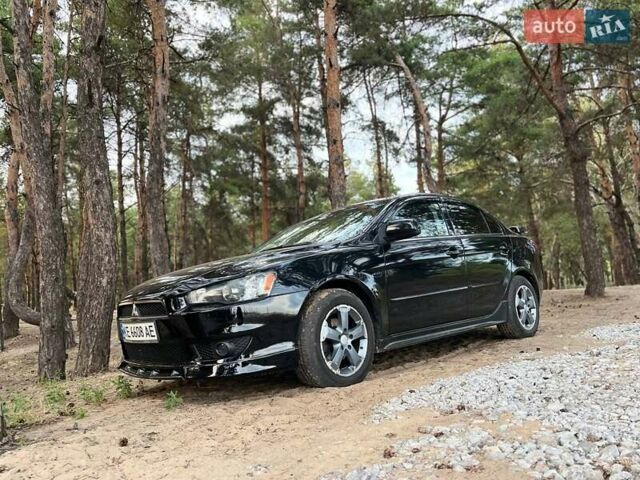 Чорний Міцубісі Lancer, об'ємом двигуна 2 л та пробігом 181 тис. км за 6500 $, фото 1 на Automoto.ua