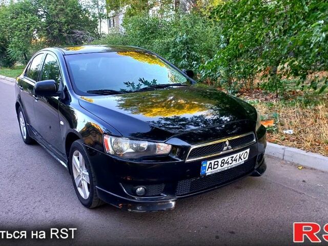 Черный Мицубиси Лансер, объемом двигателя 2 л и пробегом 290 тыс. км за 5800 $, фото 1 на Automoto.ua