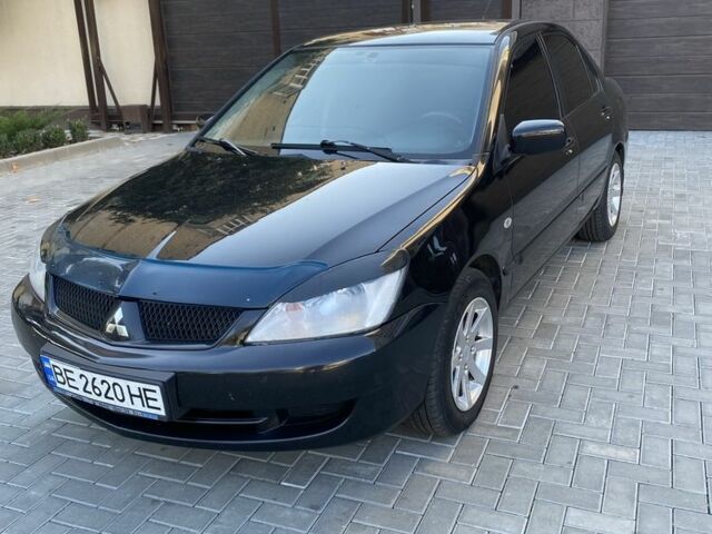 Чорний Міцубісі Lancer, об'ємом двигуна 1.6 л та пробігом 260 тис. км за 3600 $, фото 1 на Automoto.ua