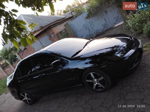 Мицубиси Лансер 2007 в Краматорске на Automoto.ua Черный Мицубиси Лансер, объемом двигателя 2 л и пробегом 193 тыс. км за 6250 $, фото 1 на Automoto.ua