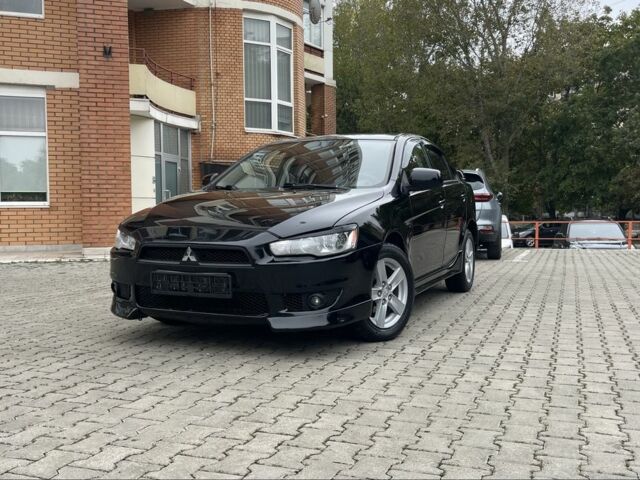 Чорний Міцубісі Lancer, об'ємом двигуна 2 л та пробігом 200 тис. км за 6800 $, фото 1 на Automoto.ua