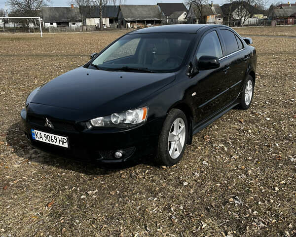 Чорний Міцубісі Lancer, об'ємом двигуна 2 л та пробігом 255 тис. км за 5000 $, фото 1 на Automoto.ua