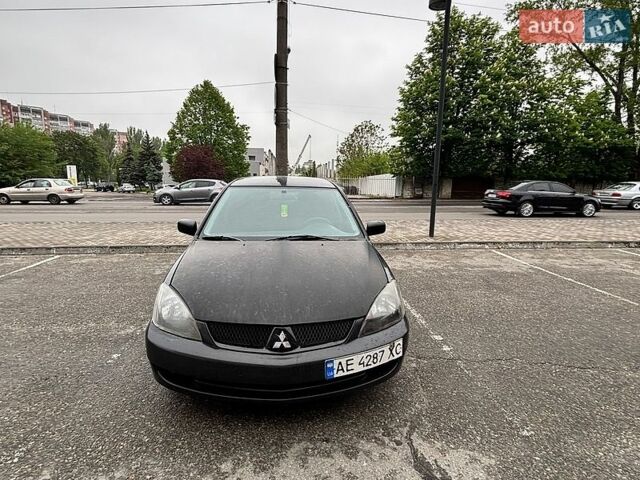 Чорний Міцубісі Lancer, об'ємом двигуна 2 л та пробігом 400 тис. км за 3000 $, фото 1 на Automoto.ua