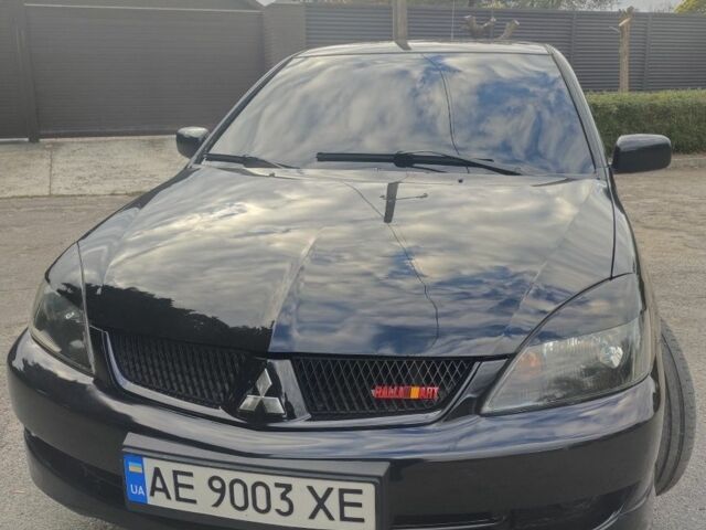 Міцубісі Lancer 2007 у Кам'янське (Дніпродзержинськ) на Automoto.ua Чорний Міцубісі Lancer, об'ємом двигуна 2 л та пробігом 268 тис. км за 5999 $, фото 1 на Automoto.ua
