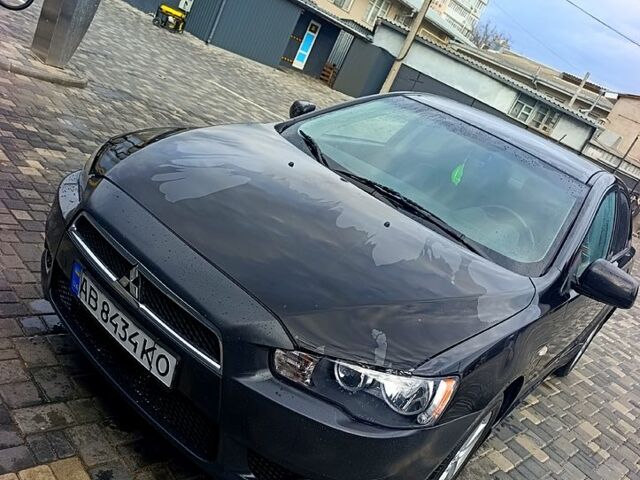 Чорний Міцубісі Lancer, об'ємом двигуна 2 л та пробігом 250 тис. км за 5300 $, фото 1 на Automoto.ua