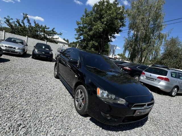 Чорний Міцубісі Lancer, об'ємом двигуна 2 л та пробігом 253 тис. км за 6400 $, фото 1 на Automoto.ua