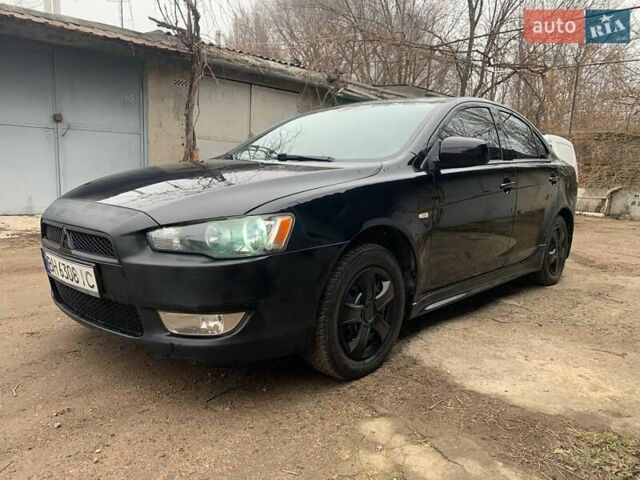Чорний Міцубісі Lancer, об'ємом двигуна 2 л та пробігом 216 тис. км за 6200 $, фото 1 на Automoto.ua