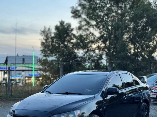 Чорний Міцубісі Lancer, об'ємом двигуна 2 л та пробігом 200 тис. км за 3850 $, фото 1 на Automoto.ua
